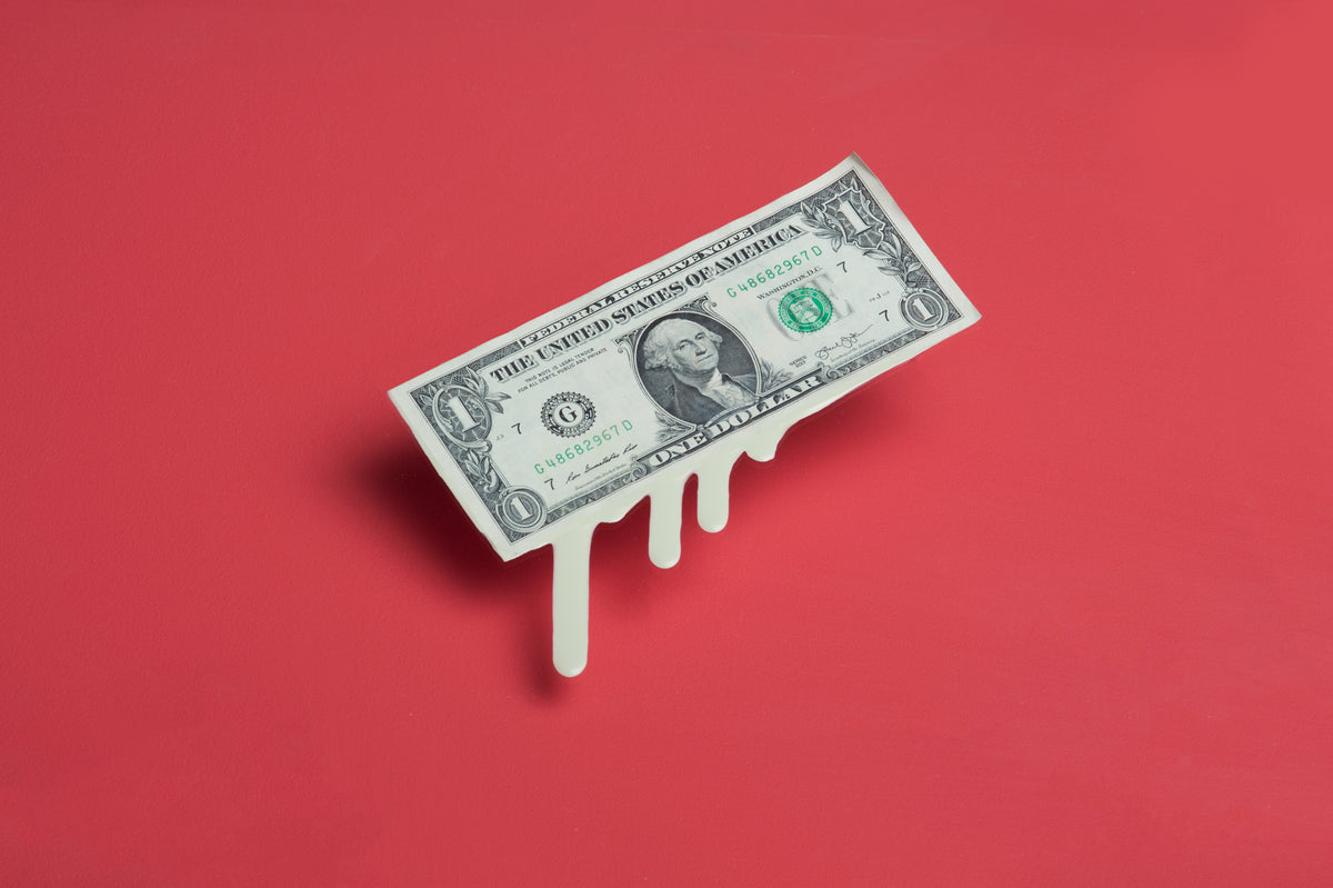 a dollar bill melting